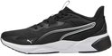 Zwarte Puma sportschoen met witte zool, zilveren strepen op de zijkant en Puma-logo.