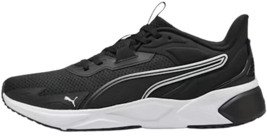Zwarte Puma sportschoen met witte zool, zilveren strepen op de zijkant en Puma-logo.
