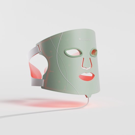 Mintgroen Nanoleaf LED gezichtsmasker met rode gloed, op witte achtergrond.