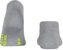 Grijze sokken met neon gele opdruk 'COOL KICK' en maatindicatie '37-39'.