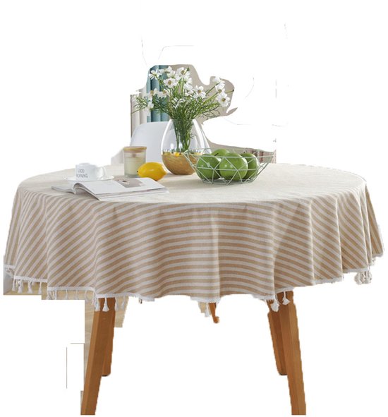 Nappe ronde à rayures beiges et blanches avec franges sur fond blanc.