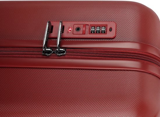 Valise rouge avec un cadenas à combinaison TSA et fermeture éclair.