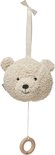 Crèmekleurige teddybeer muziekdoos met houten ring.