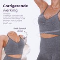 Grijze sport BH met V-hals, dunne bandjes en een gerimpeld design op de borst.