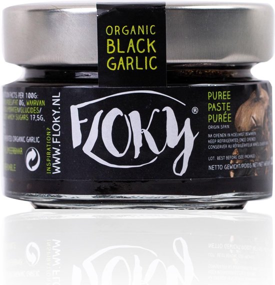 Glazen potje met zwarte Floky biologische zwarte knoflookpuree. Zilverkleurig deksel.