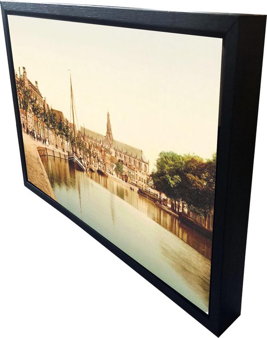 Oud Stadsgezicht Haarlem - Het Spaarne en Turfmarkt - Oude Foto Print op Canvas Doek 90x60cm in zwarte houten baklijst