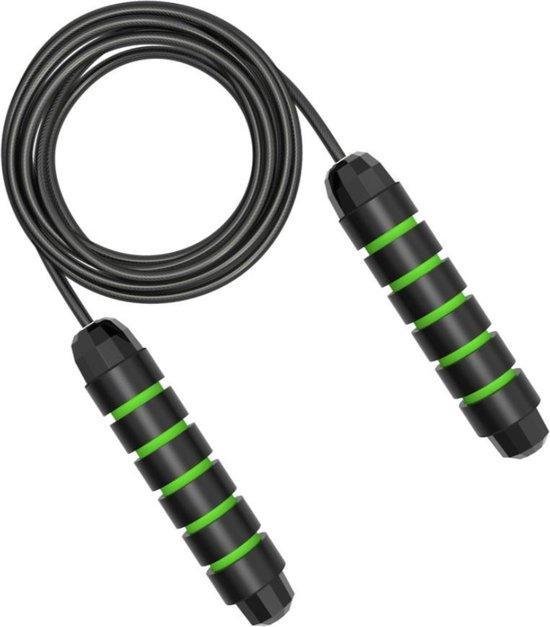 Zwart springtouw met zwarte en groene handvatten.