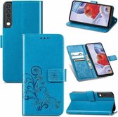 Voor LG Stylo 7 4G Vierbladige Sluiting Reliëf Gesp Mobiele Telefoon Bescherming Lederen Case met Lanyard & Kaartsleuf & Portemonnee & Beugel Functie (Blauw)