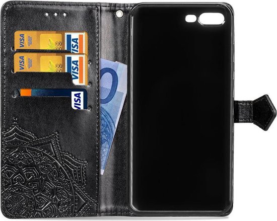 Étui noir ouvert avec fentes pour cartes et argent, et relief.