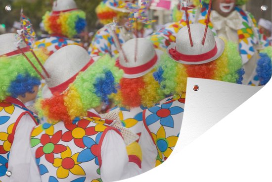 Kinderen als clown tijdens carnaval bij de straatparades