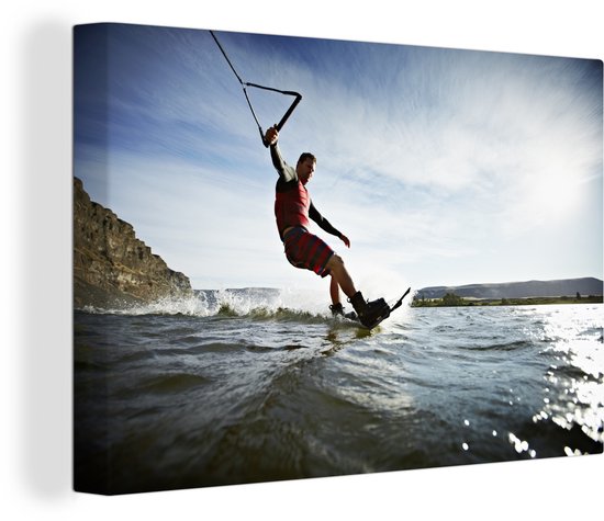 Un homme wakeboard sur toile d'eau de mer calme 120x80 cm - Tirage photo sur toile (Décoration murale salon / chambre)