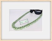 Last trend in fashion accessoires brillenkoord word vervangen door modieus Jade kleur grote schakels ketting.