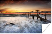 Zonsondergang op strand met houten pier 180x120 cm / Zee en Strand XXL / Groot formaat! - Foto print op Poster (wanddecoratie woonkamer / slaapkamer)