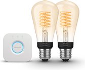 Philips Hue Starterspakket White E27 - Filament Edison Klein (ST64) - 2 Hue E27 LED Lampen en Bridge - Eenvoudige Installatie - Werkt met Alexa en Google Home