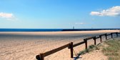 Tuinposter - Zee / Water - Strand in wit / grijs / zwart / blauw / groen / bruin / beige - 120 x 240 cm