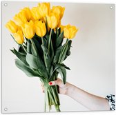 Tuinposter – Bos Gele Tulpen in Hand - 80x80cm Foto op Tuinposter  (wanddecoratie voor buiten en binnen)