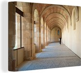Canvas Schilderij Klooster - Spanje - Boog - Architectuur - 120x90 cm - Wanddecoratie