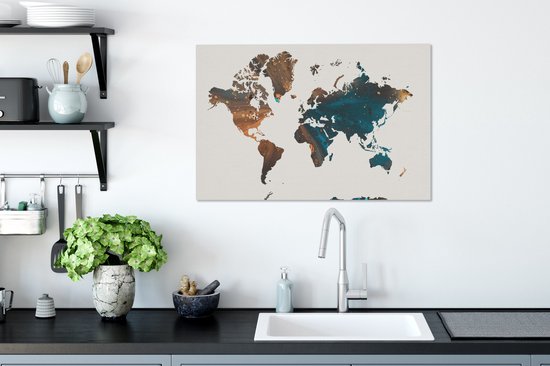 Wereldkaart en peinture bleu foncé et orange sur fond rose 60x40 cm