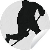 Tuincirkel Een dribbelende ijshockeyer in een illustratie - 90x90 cm - Ronde Tuinposter - Buiten