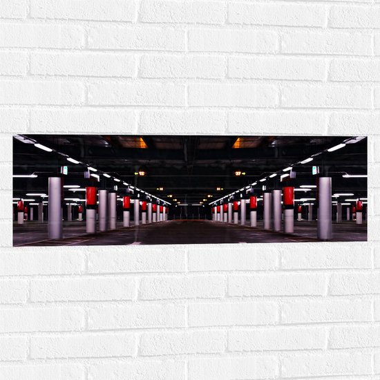 WallClassics - Muursticker - Lege parkeergarage - 90x30 cm Foto op Muursticker