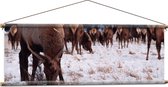 WallClassics - Textielposter - Kudde Herten in de Sneeuw - 120x40 cm Foto op Textiel