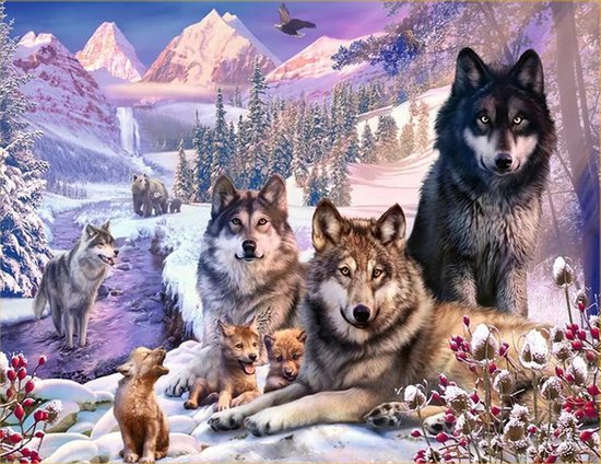 Une photo de groupe de loups dans un paysage enneigé, avec des montagnes et des arbres en arrière-plan.