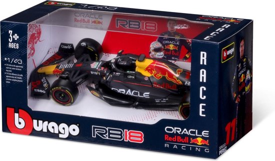 RB18 Formule 1 auto in doos met Red Bull logo's en Sergio Perez afbeelding.