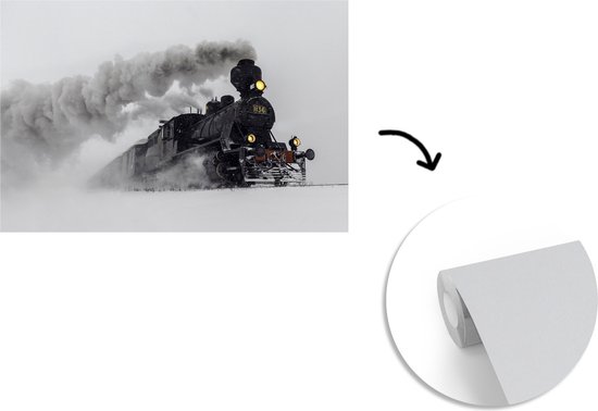 Behang - Fotobehang Stoomlocomotief in de sneeuw - liggend - Breedte 420 cm x hoogte 280 cm