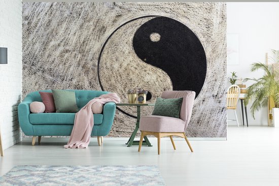 Symbole du Yin et du Yang sur fond gris fotobehang