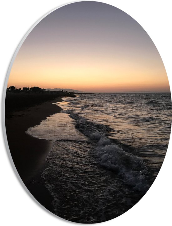 PVC Schuimplaat Ovaal - Golvende Zee met Zonsondergang - 21x28 cm Foto op Ovaal (Met Ophangsysteem)
