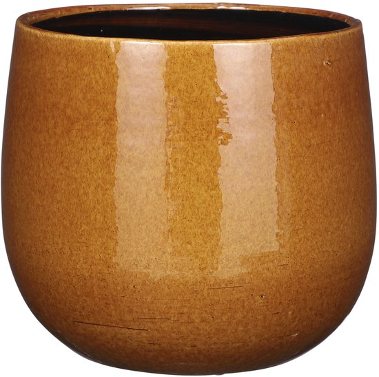Pot en céramique ocre brillante, tachetée, de forme ronde avec un intérieur sombre.