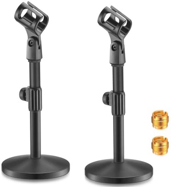 Twee zwarte metalen desktop microfoonstandaards met ronde basis en twee gouden 3/8" female tot 5/8" male adapters.