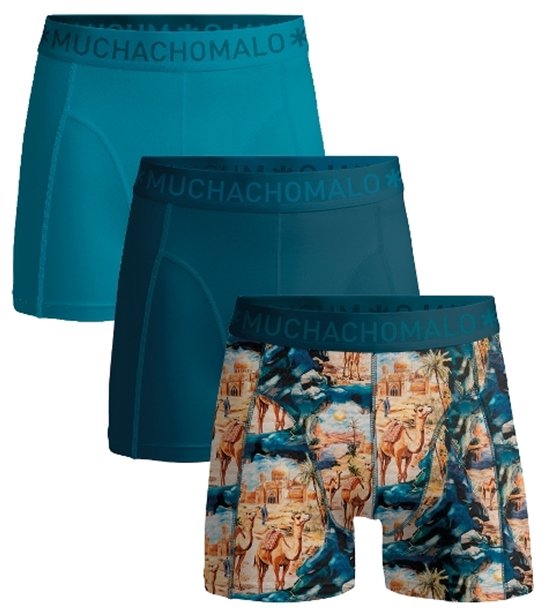 Drie Muchachomalo boxershorts in petrolblauw, donkerpetrolblauw en met een woestijnprint met kamelen.