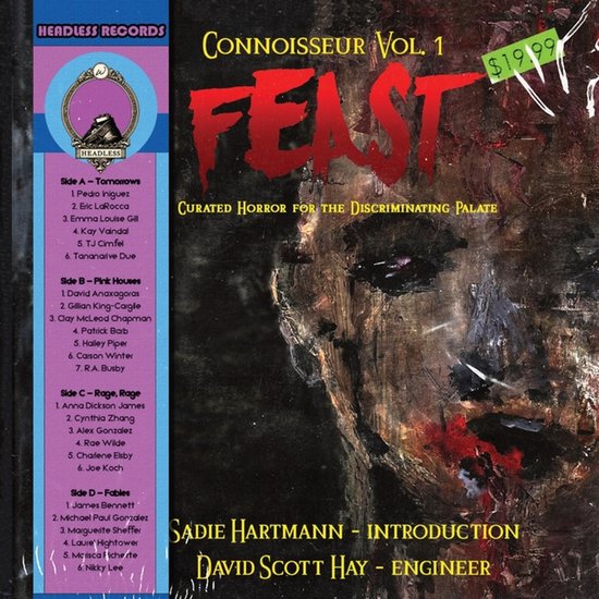 Albumhoes met "Feast" in rode letters. Gezicht in donkere tinten.