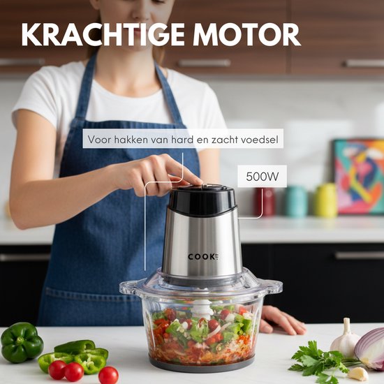 Hakmolen met krachtige 500W motor, glazen kom met fijngehakte tomaten en paprika.