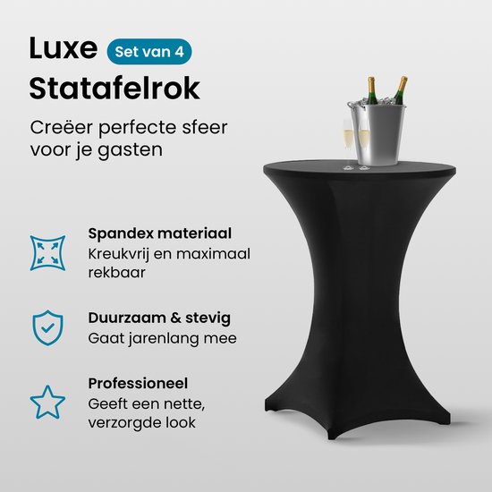 Zwarte statafelrok met champagnekoeler en glazen.
