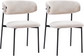 Set van twee beige eetkamerstoelen met stoffen zitting en rugleuning, en zwarte metalen poten.