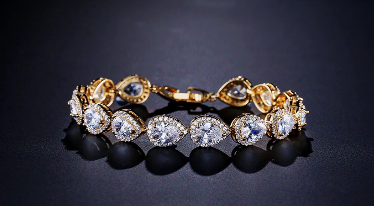 Fiory briljante armband goud| model X103| Zirkonia steentjes| armband met diamantjes| luxe armband| goud