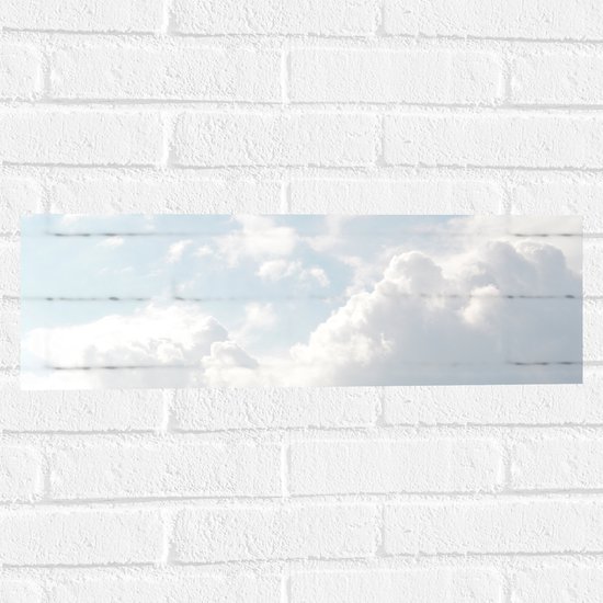 WallClassics - Muursticker - Grote Witte Wolken in de Lucht - 60x20 cm Foto op Muursticker