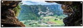 WallClassics - Tuinposter – Uitkijkend op een Vallei vanuit een Grot in de Bergen - 120x40 cm Foto op Tuinposter  (wanddecoratie voor buiten en binnen)