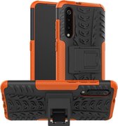 Tire Texture TPU + PC schokbestendige telefoonhoes voor Xiaomi Mi 9, met houder (oranje)