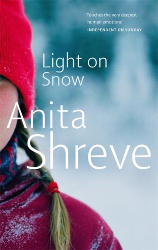 Boekomslag van 'Light on Snow' door Anita Shreve. Een meisje met een rode muts en een rode jas in de sneeuw.