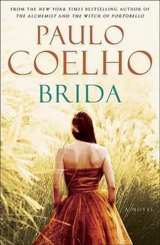 Boek "Brida" van Paulo Coelho met op de voorkant een vrouw in een oranje jurk met haar rug naar de kijker, staand in hoog gras.