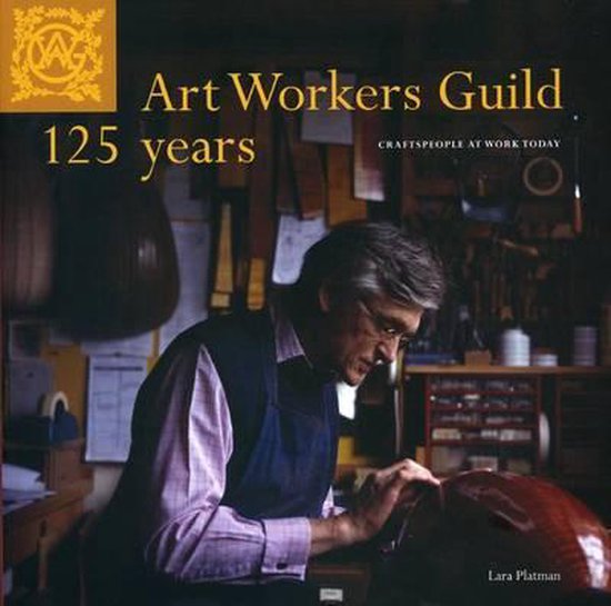 Boek: Art Workers Guild 125 years. Ambachtsman met bril werkt aan een viool.