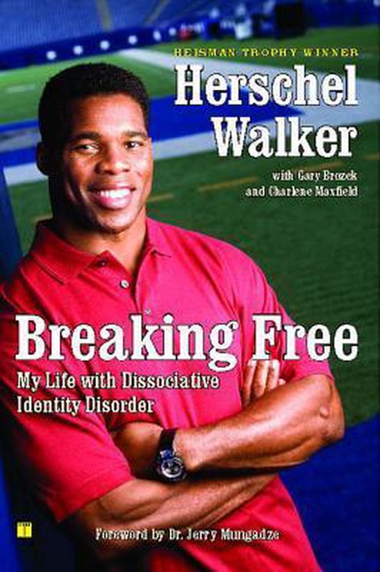 Herschel Walker, winnaar Heisman Trophy, draagt een rode polo en staat met gekruiste armen. De cover van het boek 'Breaking Free' met de titel 'My Life with Dissociative Identity Disorder'.