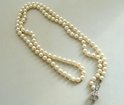 Parelsnoer met gouden slot en diamanten Parelsnoer met gouden slot en diamanten