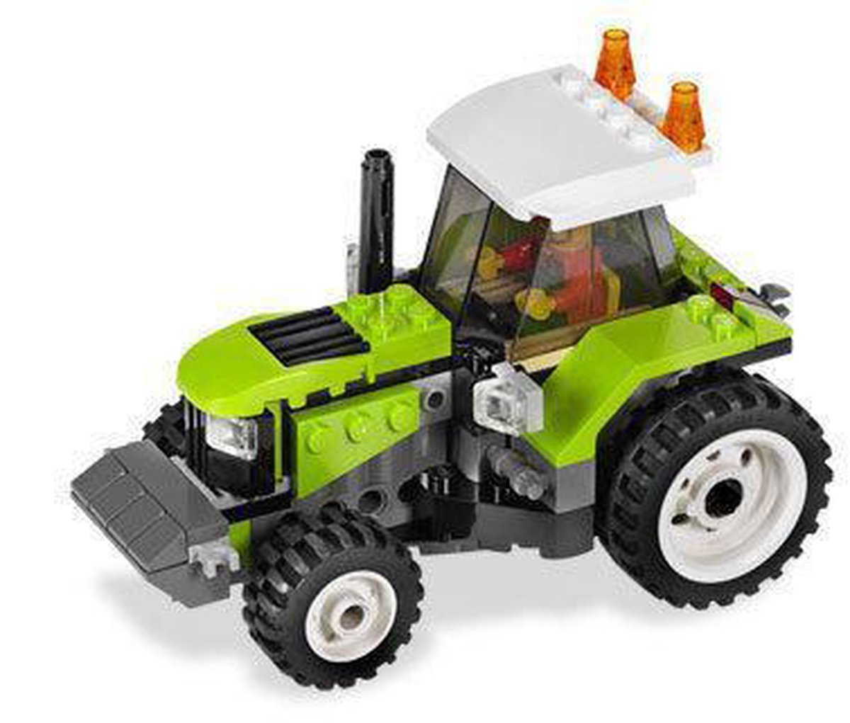 Ferme porcine et tracteur LEGO City - 7684