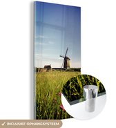 MuchoWow® Glasschilderij 80x160 cm - Schilderij acrylglas - Een molen met bloemen - Foto op glas - Schilderijen