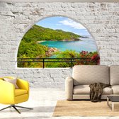 Fotobehangkoning - Behang - Vliesbehang - Fotobehang Uitzicht op het Eiland vanaf het Terras 3D -  Emerald Island - 100 x 70 cm