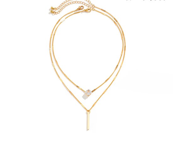 Gouden dubbele ketting met zirkonia hartje en staafje.